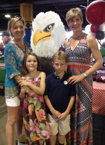 Lisa and Andrew Hawks pictured with Ann '96 and Tilly Webster at Auggie Night at the Races at Canterbury Park.