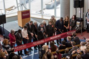 (L-R) Karen Kaivola, BK Kormah, Mayor Jacob Frey, Jeff Nodland, Mike Good, President Paul Pribbenow, Norman Hagfors, Evangeline Hagfors, Peter McLaughlin Abdi Warsame, Francesca Chiari and Lori Higgins ready to cut the ribbon.