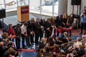 (L-R) Karen Kaivola, BK Kormah, Mayor Jacob Frey, Jeff Nodland, Mike Good, President Paul Pribbenow, Norman Hagfors, Evangeline Hagfors, Peter McLaughlin Abdi Warsame, Francesca Chiari and Lori Higgins cut the ribbon.