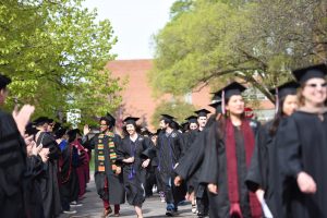 Students walking in graduaton