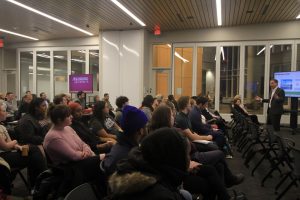 Nick Gangestad talking to students and faculty