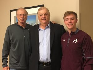 Bruce Olson '71, his brother Brad Olson '73, and scholarship recipient Nick Thompson