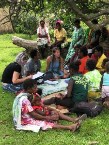 Briana and Britta doing research with the help Of local Peace Corps volunteer Christy Kosak.