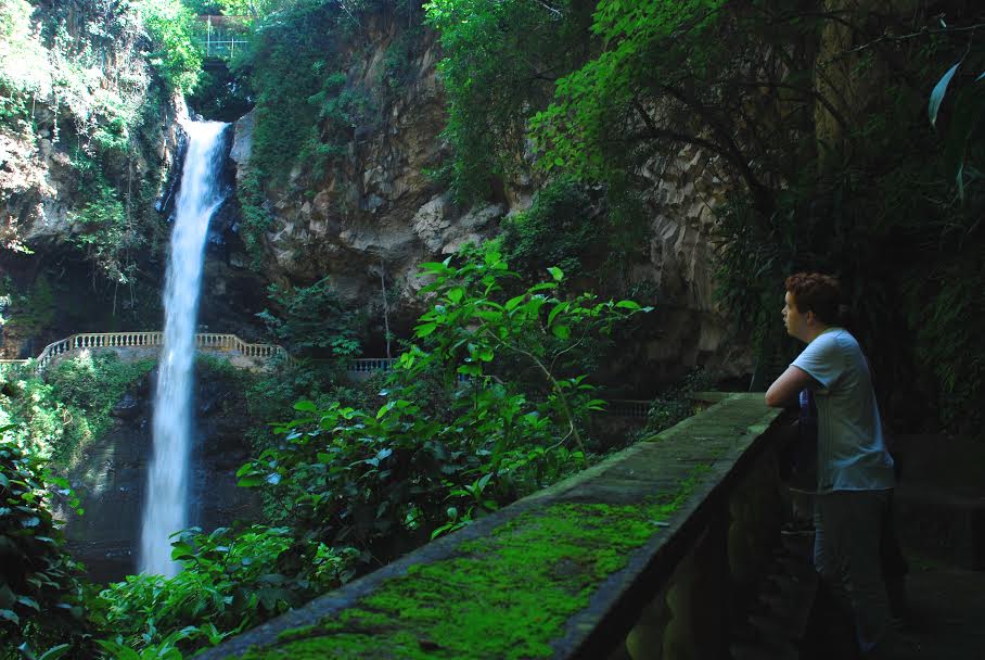 Student looking at waterfalls