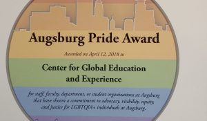 Pride Award for CGEE on rainbow paper