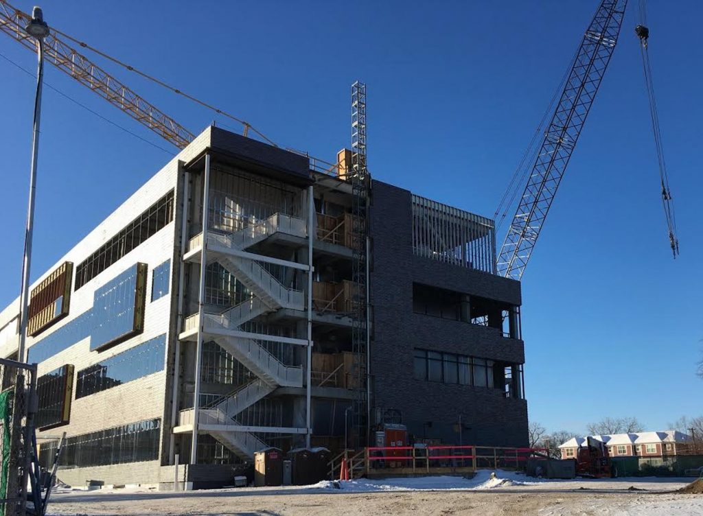 The mechanical area on the fourth-level of the north wing is visible from the north gate of the construction site.