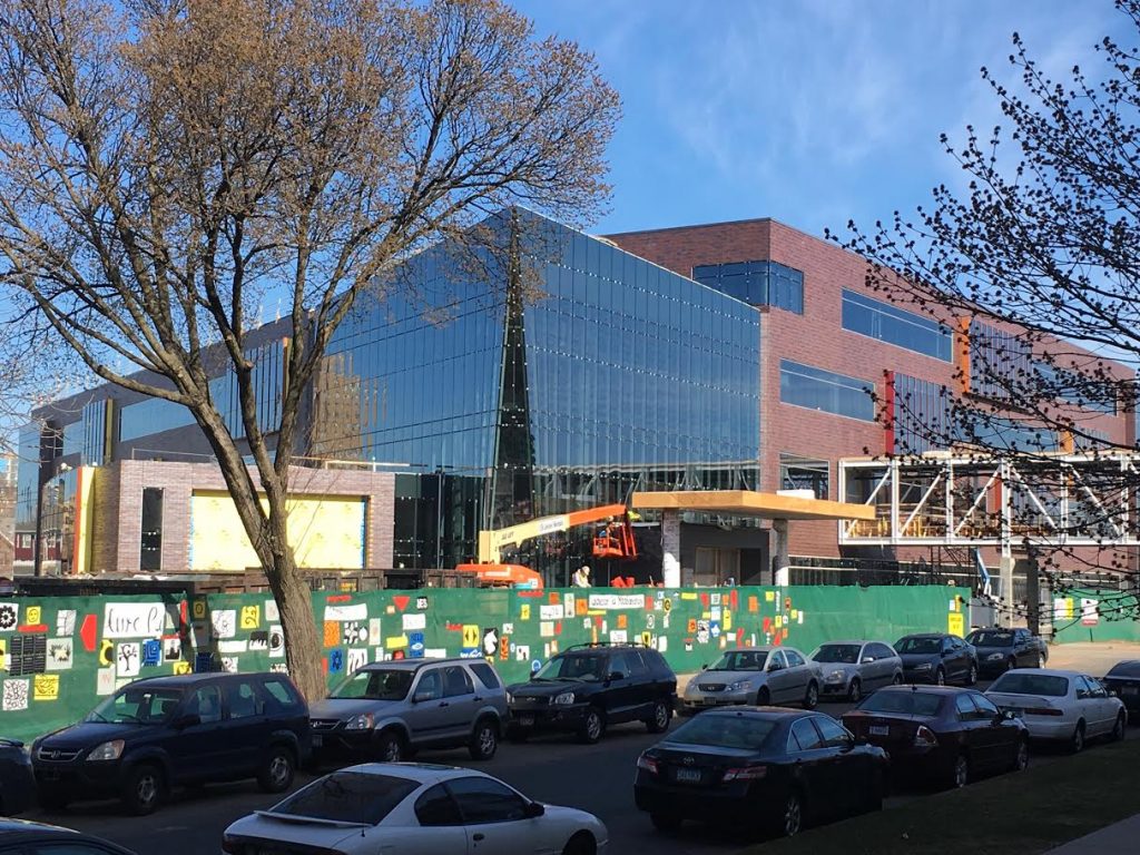 A view of the Hagfors Center main entrance with the 3-story lobby fully enclosed.