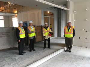 The Hagfors tour the site with Architect Bill Blanski and President Pribbenow