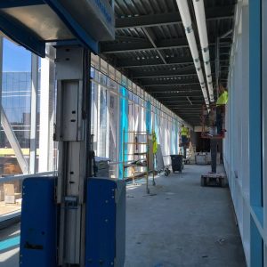 Crews work on the interior soffits of the skyway.