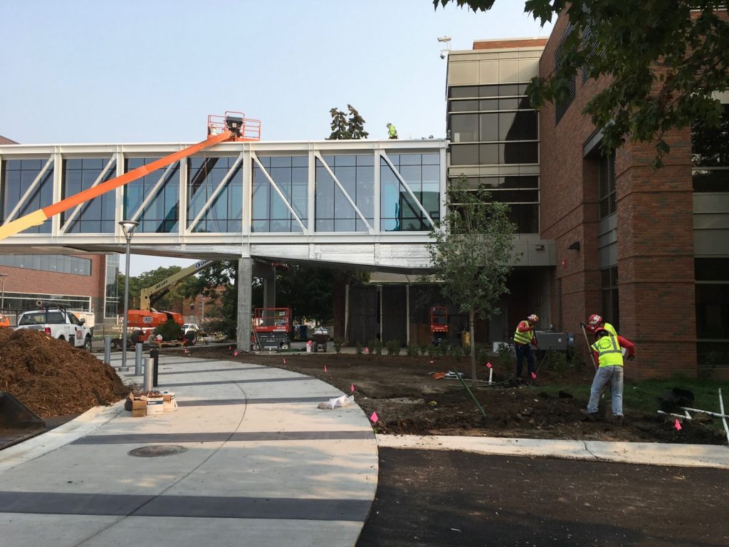 Crews grade the area around the new roundabout at South 7th Street and 21st Avenue South