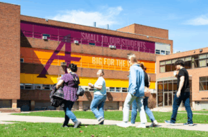 Students cross the quad at ���߲ݴ�ý in the Cedar-Riverside neighborhood of Minneapolis