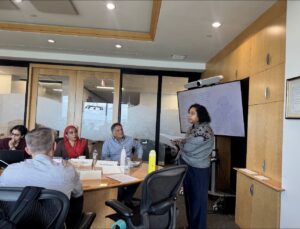 Interfaith leaders gather in a conference room
