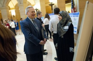 Amineh Safi ’14 talks with Ted Grindal ’76, Augsburg Regent Emeritus and former chair of the Board of Regents.