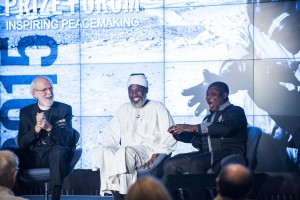 Rev. Mark Hanson, left, moderates a panel at the Nobel Peace Prize Forum with Imam Muhammad Ashafa and Pastor James Wuye. 