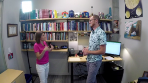 Ben Denkinger speaking with WCCO’s Heather Brown in an office
