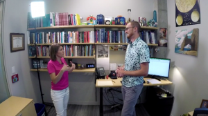 Ben Denkinger speaking with WCCO’s Heather Brown in an office 