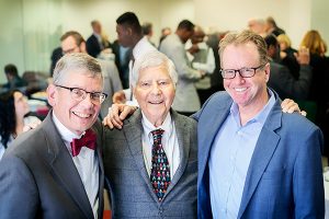 Augsburg President Paul Pribbenow (left), Urban Investors founder Peter Heegaard, and Mike Christenson celebrated the Urban Investors program Thursday at a reception at Augsburg. (Photo: Courtney Perry)
