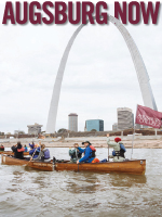 Spring 2016 Issue cover. Features students in a canoe with an Augsburg College, in front of the St. Louis Arch