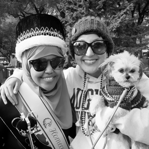 Students smiling for a photo at homecoming