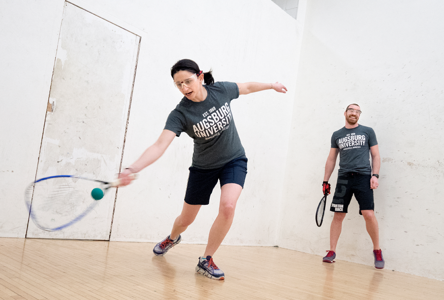 Maggie Sotos, left, and Josh Owens, right, playing racketball