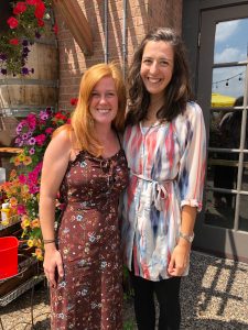 Joy Adams, PA-C and Kelsey McFarlane, PA-C outside on patio 