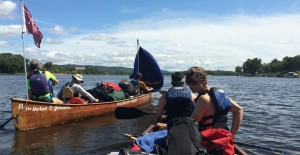 Students in canoes on the Mississippi River.