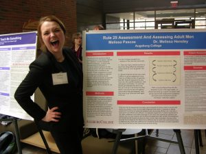 student with poster