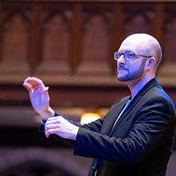A music conductor at Advent Vespers