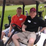 President Pribbenow & Erik Helgerson on a golf cart