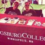 Provost Karen Kaivola and Bonnie Tensen, e-learning specialist, at Augsburg table for Twin Cities Pride.