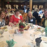 Guests seated around a table