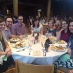 Guests seated around a table