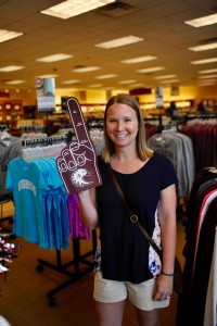 Taking a break in the bookstore, Stacy (Waterman) Newton affirms that Auggies are #1.