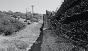 Black and white photo of border wall