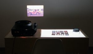 Projector showing photo of old car