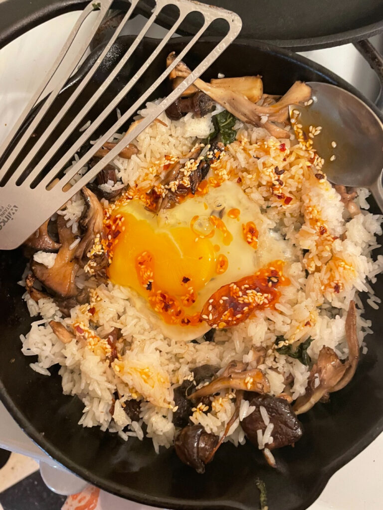 Fried rice with fried egg and chili oil on top