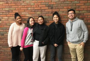The five students who are Christensen Interns standing next to each other