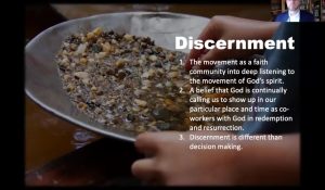 Discernment. The image of a hands panning for treasure among rocks.