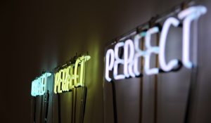 neon signs that read "perfect perfect perfect"