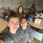 Mentors in lunch room taking selfie