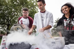 student and professor working with liquid nitrogen