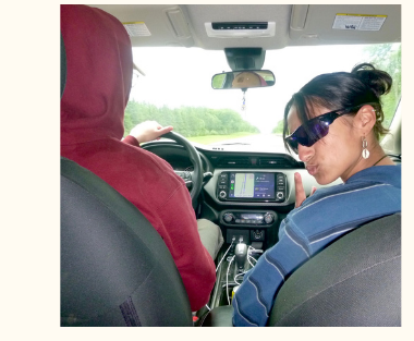 StepUP Scholars in a car
