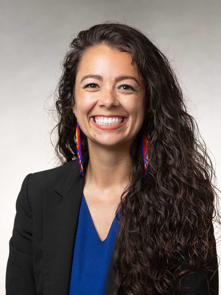 Alicia Nguyen Powers smiling at the camera.