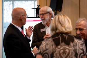 Fuad and Bishop Mark Hanson ‘68 discussing the future of the Interfaith Institute