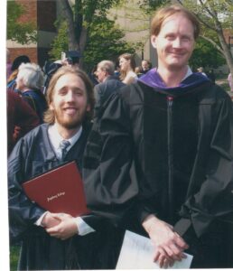 Erik with Professor Bob Groven at graduation.