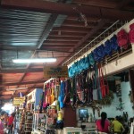 colorful bags hang in the marketplace