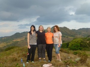 Group stands on a mountain