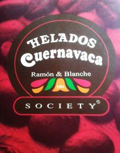 a red sign reads Helados Cuernavaca Society