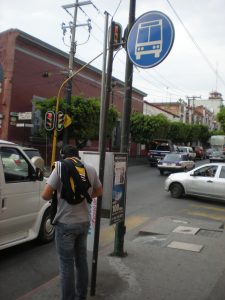 Student at bus stop