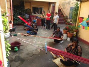 women weave hammocks in Guatemala